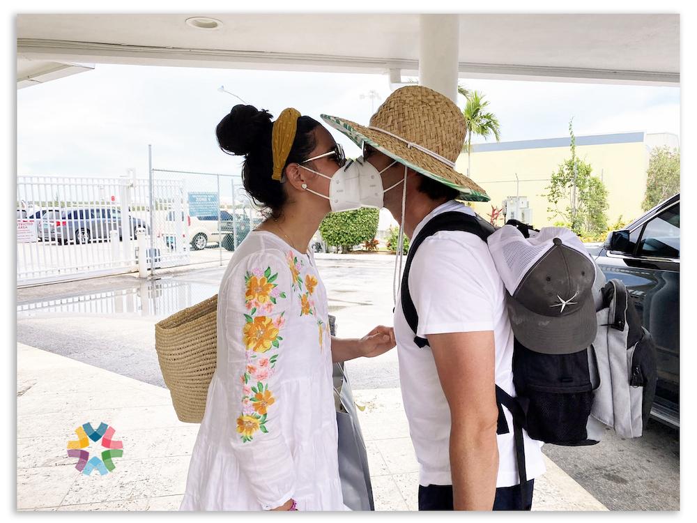 Ashley Katzen and her husband, with masks
